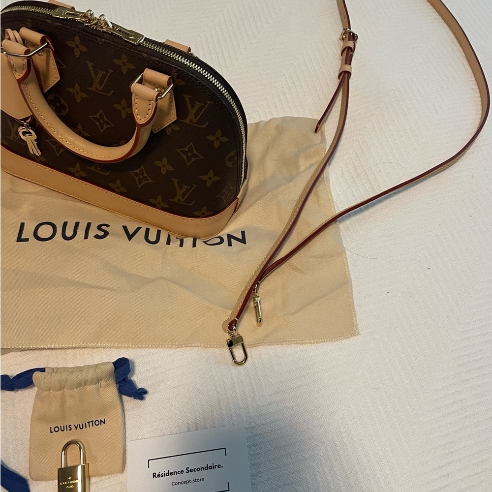 Brand new authentic Louis Vuitton Alma BB Mini Bag Brown Tan Iconic Design.